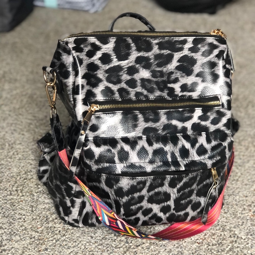 Gray leopard backpack bag